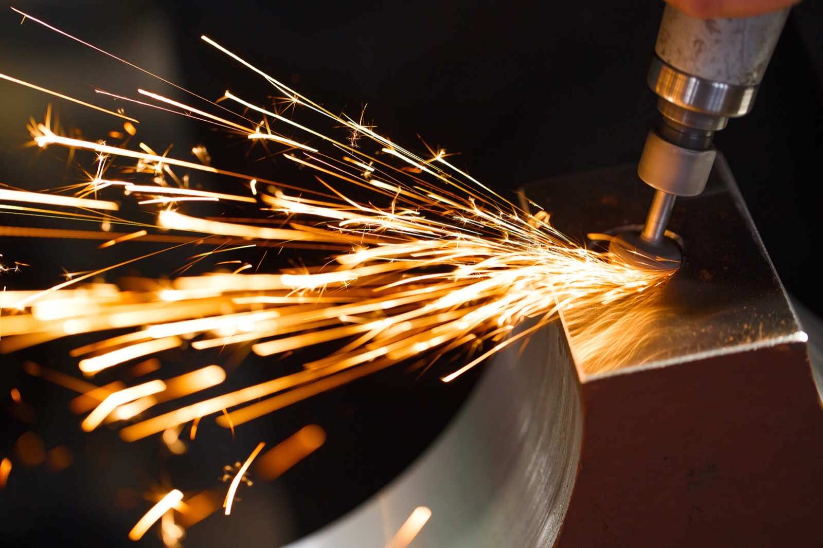 Grinding sparks on a metal edge